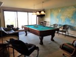 Lower level with pool table and flat screen tv